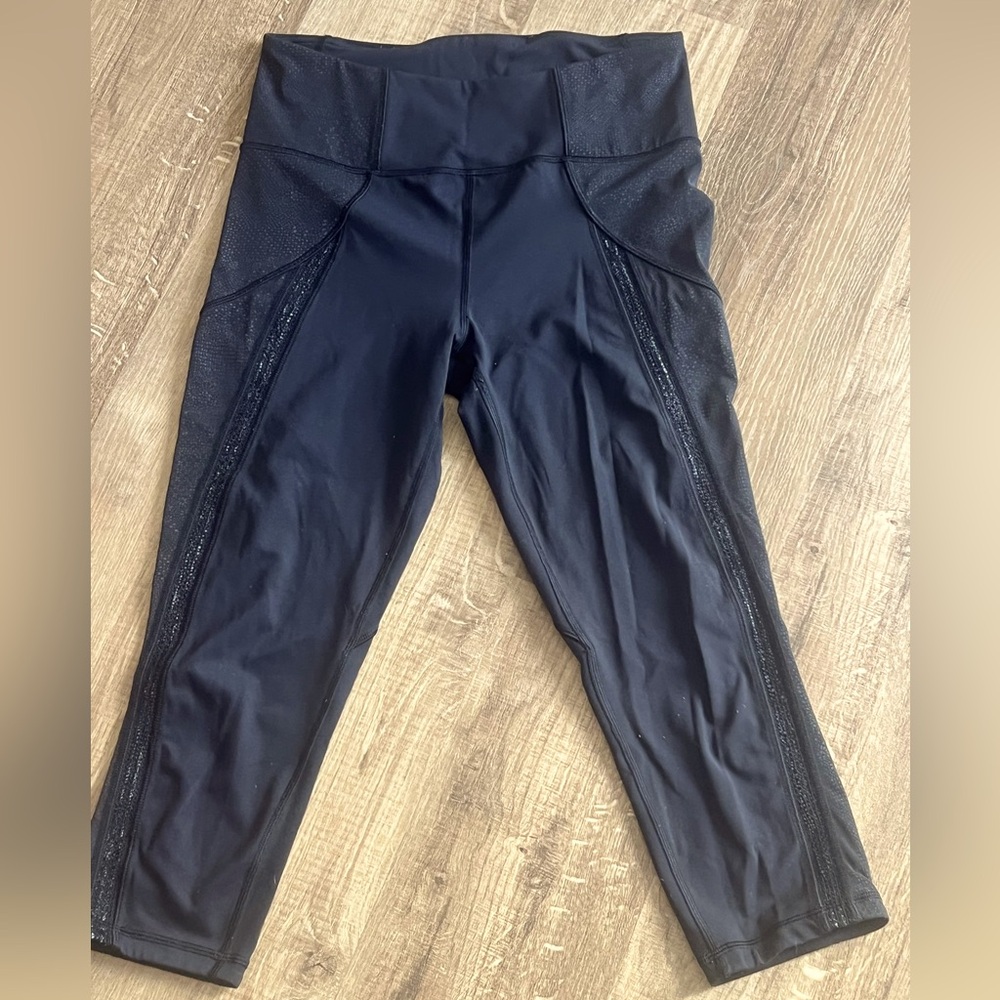 Lululemon Black High-Waisted cropped leggings with lightly sparkled trim on side